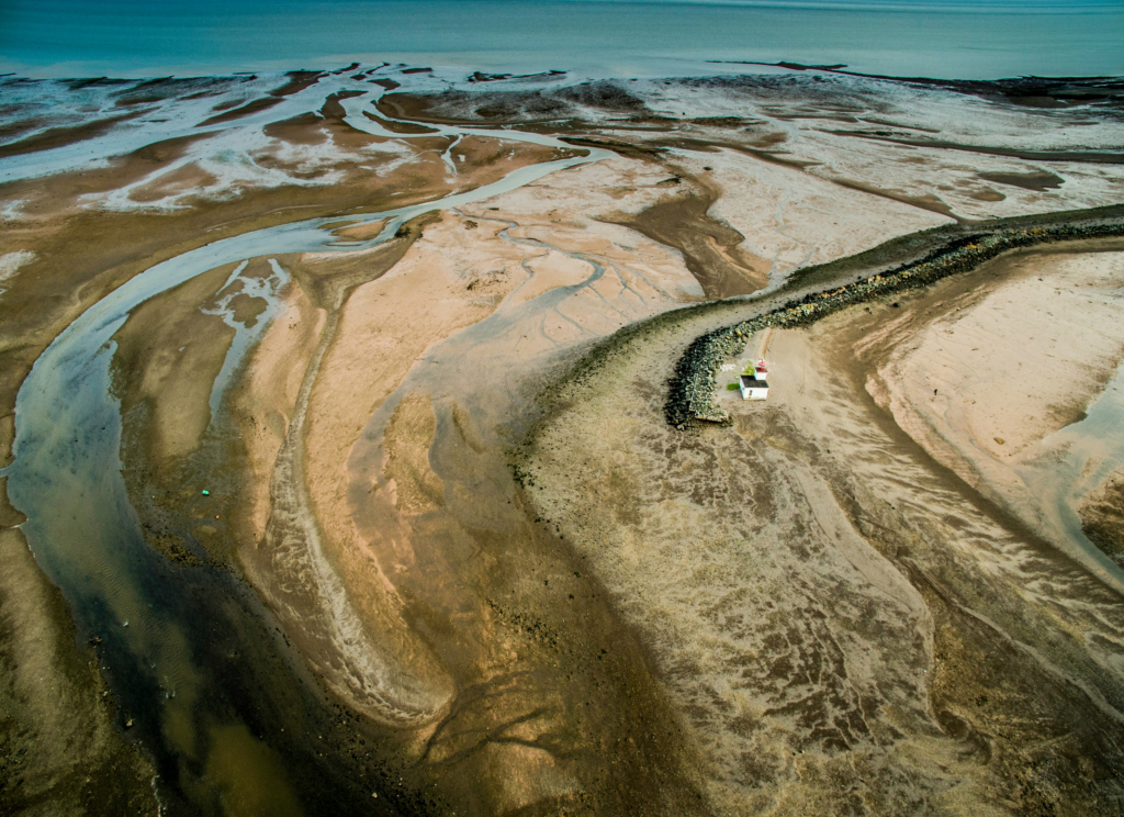 Aerial Shot River Into The Sea
